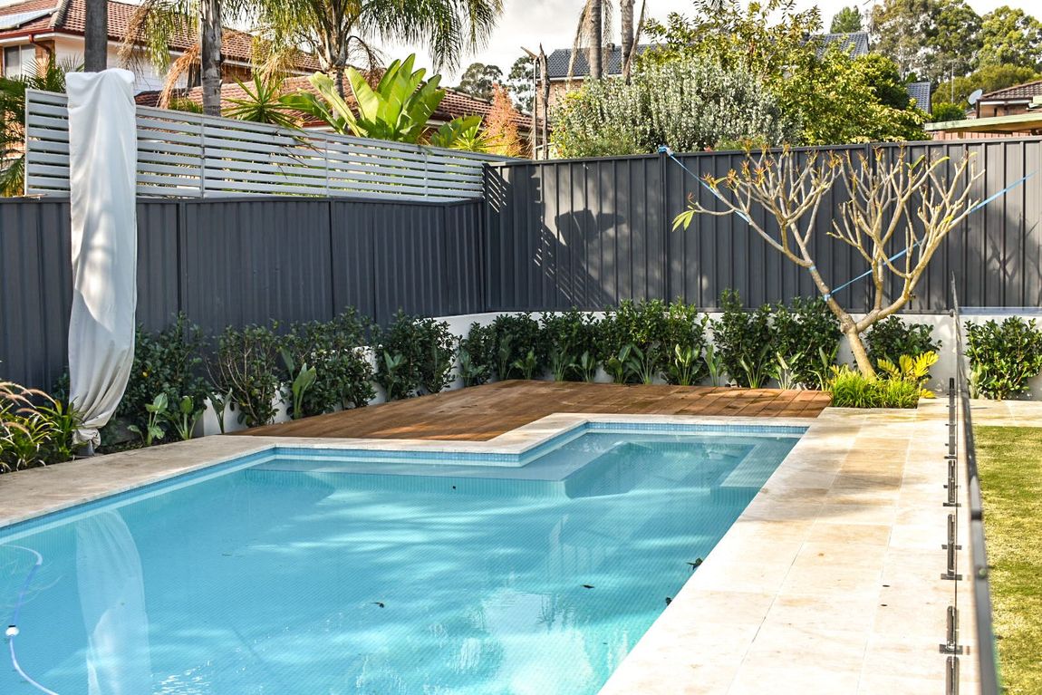 Landscaped pool and decking built by Tindale Building